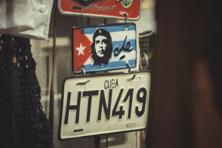 Traditional handcrafted vehicle registration plates like souvenirs for sale in La Havana, Cuba.のeditorial素材