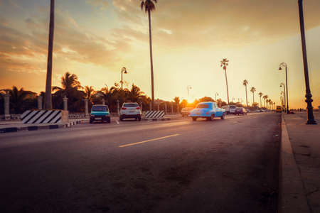 Cars on the street at sunset in Havana, Cuba. Cityscapeの写真素材