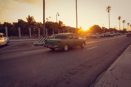Car on the road at sunset in Havana, Cuba. High quality photoの写真素材