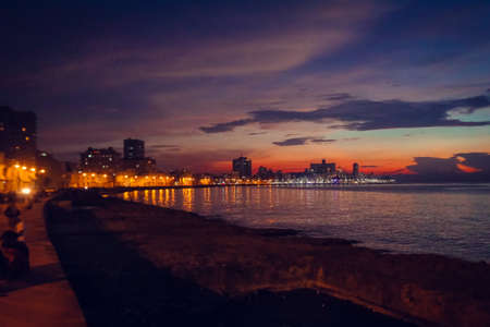 Sunset on the Mediterranean coast in Cadiz, Andalusia, Spainの写真素材