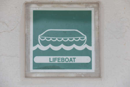 Lifeboat sign on the wall of a building in Bologna Italy