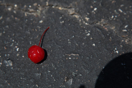 fresh red cherries fruit on black floor background