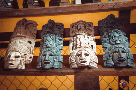 A majestic view of the ruins of the Chacchoben Mayan Ruins with tourists nearbyの写真素材
