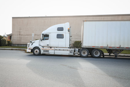 Big white truck with a white trailer with a blank space for textの写真素材