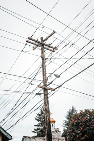 old wooden electricity postの写真素材