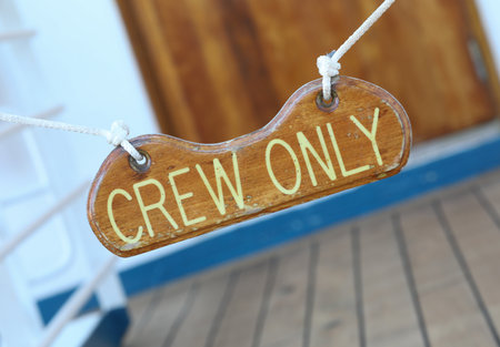 Crew only sign on a cruise ship open deck