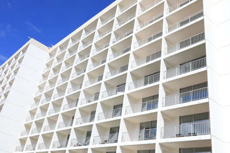 Architecture details white Concrete wall Geometric pattern building Abstract Backgroundの写真素材