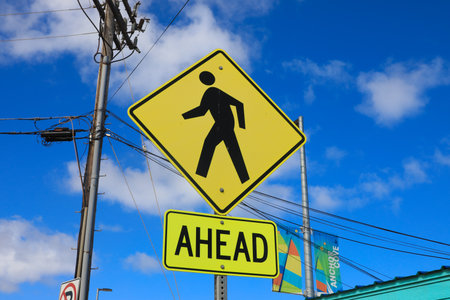 Pedestrian crossing sign with blurred backgroundの写真素材