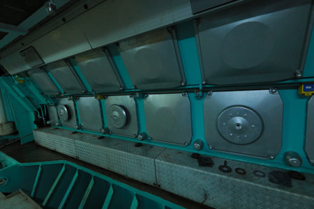 Cruise ship engine room interior with water tight doors electrical and diesel engines, water pipes, measuring instruments, diesel enginesの写真素材