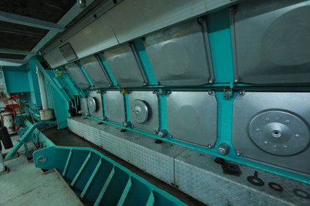Cruise ship engine room interior with water tight doors electrical and diesel engines, water pipes,...