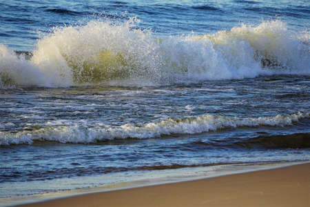 Small Waves Crash Beachの写真素材