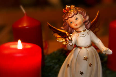 Angel with candleの写真素材