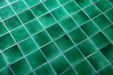 green glossy tiles, floor patternの写真素材