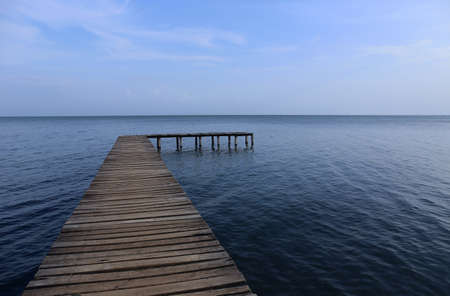Wooden Boardwalk over Water, your way to.の写真素材