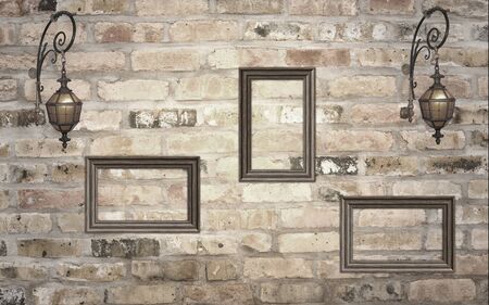 Empty frames and lanterns on the brick wall 