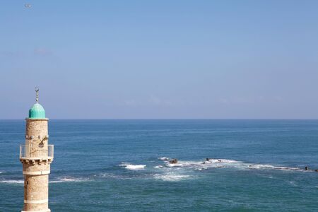 Mosque minaret and seascapeの写真素材