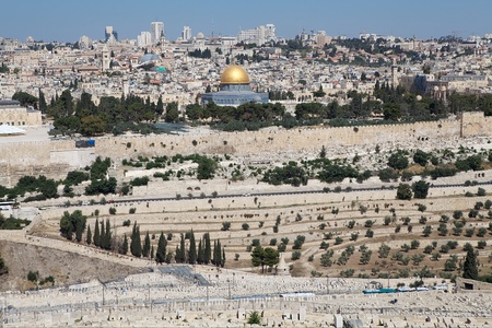 Jerusalem old town cityview with the view of the Dome of the Rock mosque and the domes of the church of the holy Sepulchre in the background from the Mount of Olives, Jerusalem, Israelの写真素材