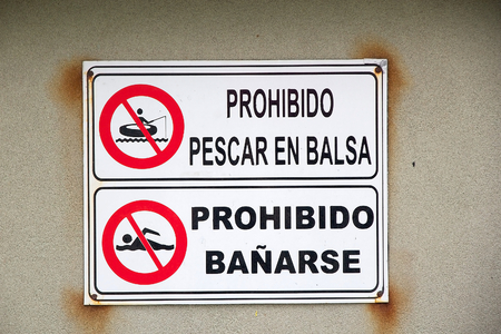 Swimming and fishing is not allowed along the Malecon, the broad esplanade, roadway and seawall at the Havana, Cubaの写真素材