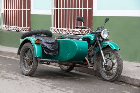 Old classic sidecar along the street in Sancti Spiritus, Cuba