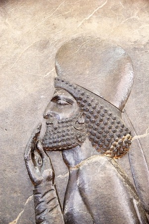 Human head from a frieze of tale from the Apadana Palace at the Persepolis, the capital of the Achaemenid Empire, 550-330 BC, Iranのeditorial素材