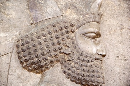 Human head from a frieze of tale from the Apadana Palace at the Persepolis, the capital of the Achaemenid Empire, 550-330 BC, Iranのeditorial素材
