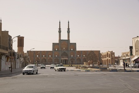 The facade with two minarets of the Amir Chakhmaq Complex at Yadz, Iran  The complx is located in a square with the same name のeditorial素材