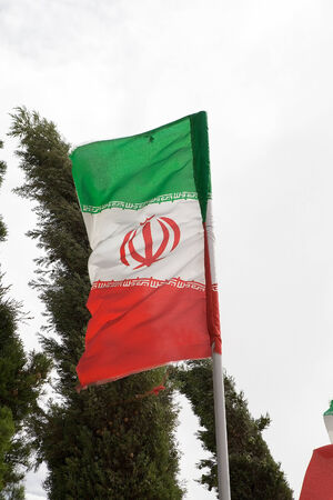 Iranian flag is waving in the windの写真素材