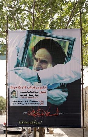 Iranian propaganda with the Ayatollah Khomeini along Imam Khomeini street at Yazd, Iran のeditorial素材