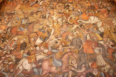 Fresco, the battle, inside the Chehel Sotoun, Isfahan, Iran. Chehel Sotoun is a pavilion in the middle of a persian garden at the far end of a long pool, built by Shah Abbas and used for his entertainment and receptions. The name mean forty columns and waのeditorial素材