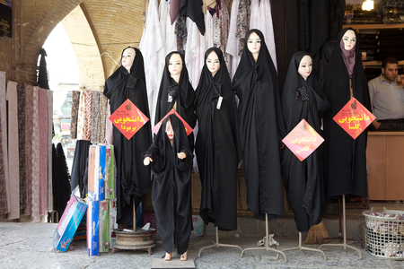 Women clothing at the shop inside the bazaar of Isfahan, Iran. The bazaar is a historical market, one of the largest bazaars in the Middle East, dating back to the 17th century. The bazaar is vaulted two kilometer street linking the old city to the new.のeditorial素材