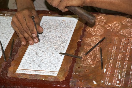Artisan is working ornamental copper at the artisan workshop in Siem Reap, Cambodiaのeditorial素材