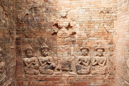 The bas relief on the interior wall of the north tower at Prasat Kravan temple ruins, Angkor, Siem Reap, cambodia. The rappresentation of Vishnuの写真素材