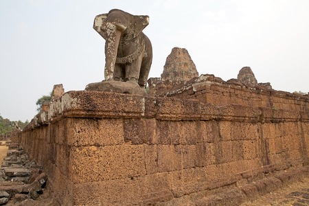 Guardian elephant  at the East Mebon temple ruins, Angkor, Siem Reap, Cambodia. East Mebon temple was built in the second half of 10th century. Built in the general style of Pre Rup, East Mebon has two enclosing and three tiers.の写真素材