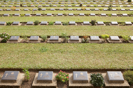 The stone graves at the Allied War Memorial Cemetery Htauk Kyant Htauk Kyant Mingaladon Township 32 km from Yangoon along the road to Bago Burma Myanmar. The memorial cemetery was built in 1951 and it is the memorial cemetery for the Allied soldiers who dのeditorial素材