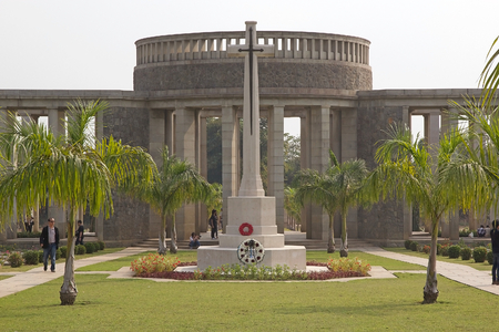 Tourists are walking in the garden of the Allied War Memorial Cemetery Htauk Kyant Htauk Kyant Mingaladon Township 32 km from Yangoon along the road to Bago Burma Myanmar. It was built in 1951 and it is the memorial cemetery for the Allied soldiers who diのeditorial素材