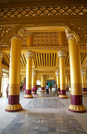Tourists are visiting the Great Audience Hall at the Bago Golden Palace Bago Myanmar. The Golden Palace is the reconstruction of the original Royal palace from the secon half of 16th century. It was rebuilt following the original design and give a good imのeditorial素材