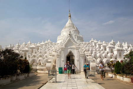 Tourist are visiting the Hsinbyume Pagoda also known as Myatheindan Pagoda. The Hsinbyume is a large white pagoda on the northern side of Mingun, Sangaing Region, Myanmar, on the western bank of Irrawaddy river. The pagoda is modeled on the Phisical descrのeditorial素材