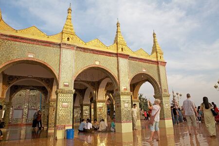 Tourist are visiting the Sutaungpyei Pagoda on top of Mandalay Hill, Mandalay, Myanmar. のeditorial素材