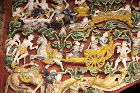Details of the wooden bas-relief in one small temple at the Shwezigon Pagoda, Nyaung U village, Bagan, Myanmar. の写真素材