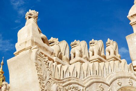 Architecture details of the Ananda Temple in Bagan, Myanmar. The Ananda Temple is a buddhist temple built in 1105 AD during the reign of King Kyanzittha. The temple was damaged in the heardquake of 1975 and it has been fully restored and is well maintaineの写真素材