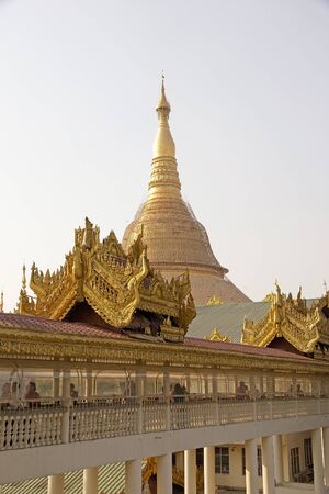 Shwedagon Pagoda is a gilded stupa located in Yangon, Myanmar. The 99 metres tall pagoda is situated on Singuttare Hill, to the West of Kandawgyi Lake and dominates the Yangon skyline. It is the most sacred Buddhist pagoda in Myanmar.のeditorial素材