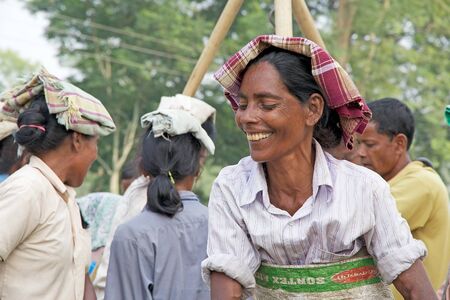 Tea harvester portrait in the tea plantation in West Bengal, India. Agriculture accounts for the...