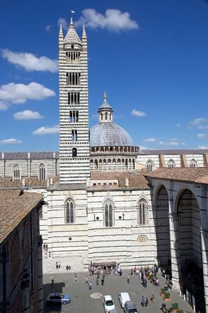 Siena Cathedral dome and tower bell aerial view in historic city of Siena, Tuscany, Italy. Siena Cathedral, Metropolitan Cathedral of Saint Mary of the Assumption, was built in 1215-1263 on the site of an earlier structure.のeditorial素材