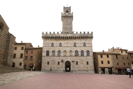 Communal Palace of Montepulciano in Piazza Grande, Montepulciano, Tuscany, Italy. Montepulciano is a medieval and Renaissance hill town. Renowned for its pork, cheese, pici pasta and honey, it is known world-wide for its wine.のeditorial素材