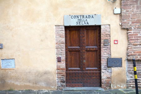 Headquarters of the Contrada of Selva, forest, in the historic centre of Siena, Tuscany, italy. Contrada is a distict and the most well-known contrade are the 17th Contrade of Siena that race the Palio. Selva runs west of Piazza del Campo.のeditorial素材