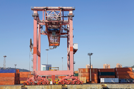 Harbour crane at the Port of Genoa, Italy. The Port of Genoa is the major italian seaport in the Mediterranean sea. It covers an area of 700 hectares of land and 500 hectares of waterのeditorial素材