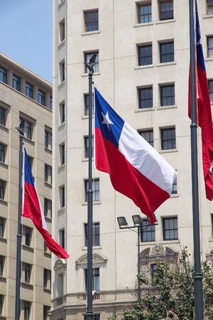 Flags of Chile in La Ciudadania square, near the La Moneda Palace, Santiago de Chile, Chileのeditorial素材