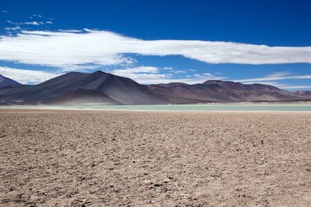 Landscape with lagoon and mountains in the Atacama desert, Chile.の写真素材