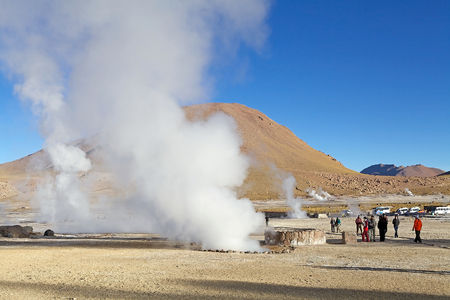 Tourists are visiting the El Tatio geysers, Chile. El Tatio is a geyser field located in the northern Chile. It is the largest geyser field in the southern hemisphere and the third geyser field in the world.のeditorial素材