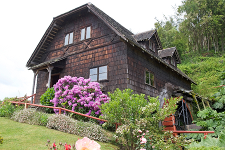 Watermill at the German Museum a Frutillar, a town in Southern Chile in the Los Lagos Region on the banks of Lake Llanquihue. The German Colony thath arrived to the city in 1856 built their house, watermill, warehouse and garden to live there. The descendのeditorial素材